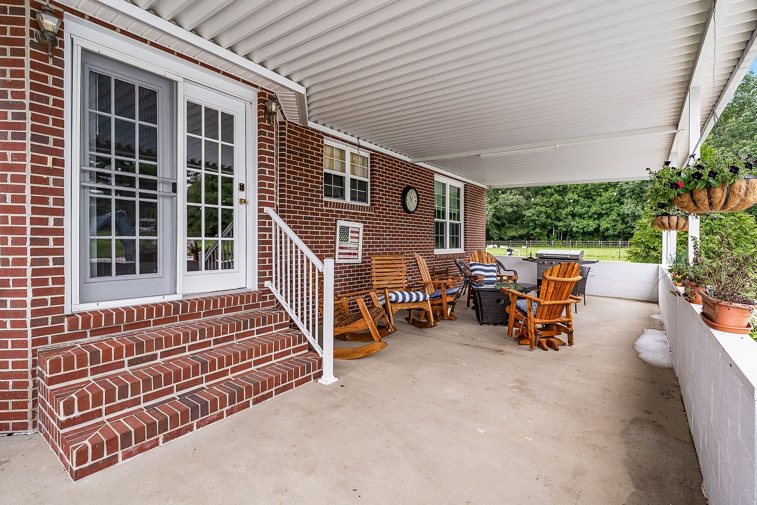 926 Ball Park Road Morrison, TN 37357 - Photo 44 of 69 a view of a patio with table and chairs and potted plants