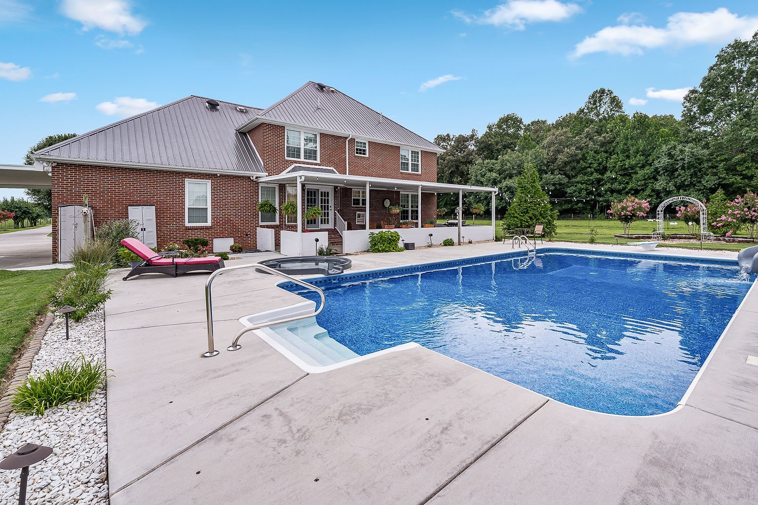 926 Ball Park Road Morrison, TN 37357 - Photo 47 of 69 a view of a swimming pool with lounge chair