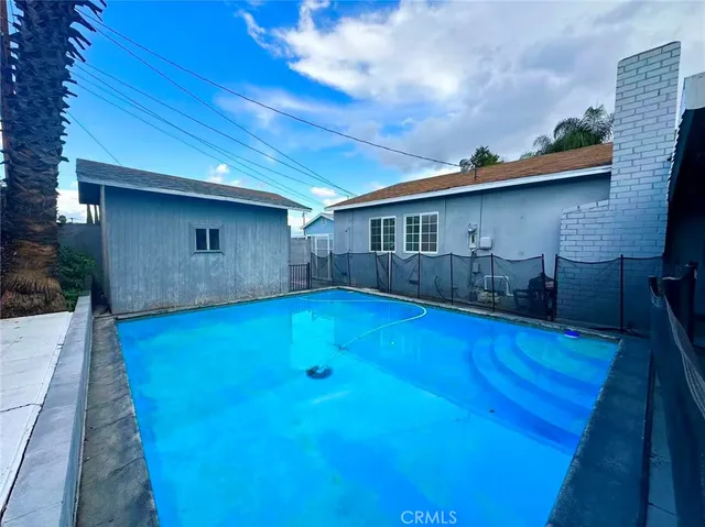 a view of a house with a swimming pool