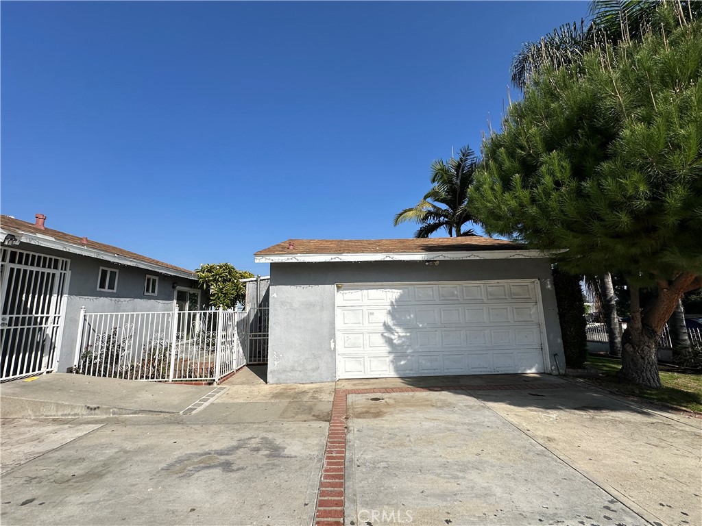 1143 South 9th Avenue Hacienda Heights, CA 91745 - Photo 2 of 15 a front view of a house with a garage