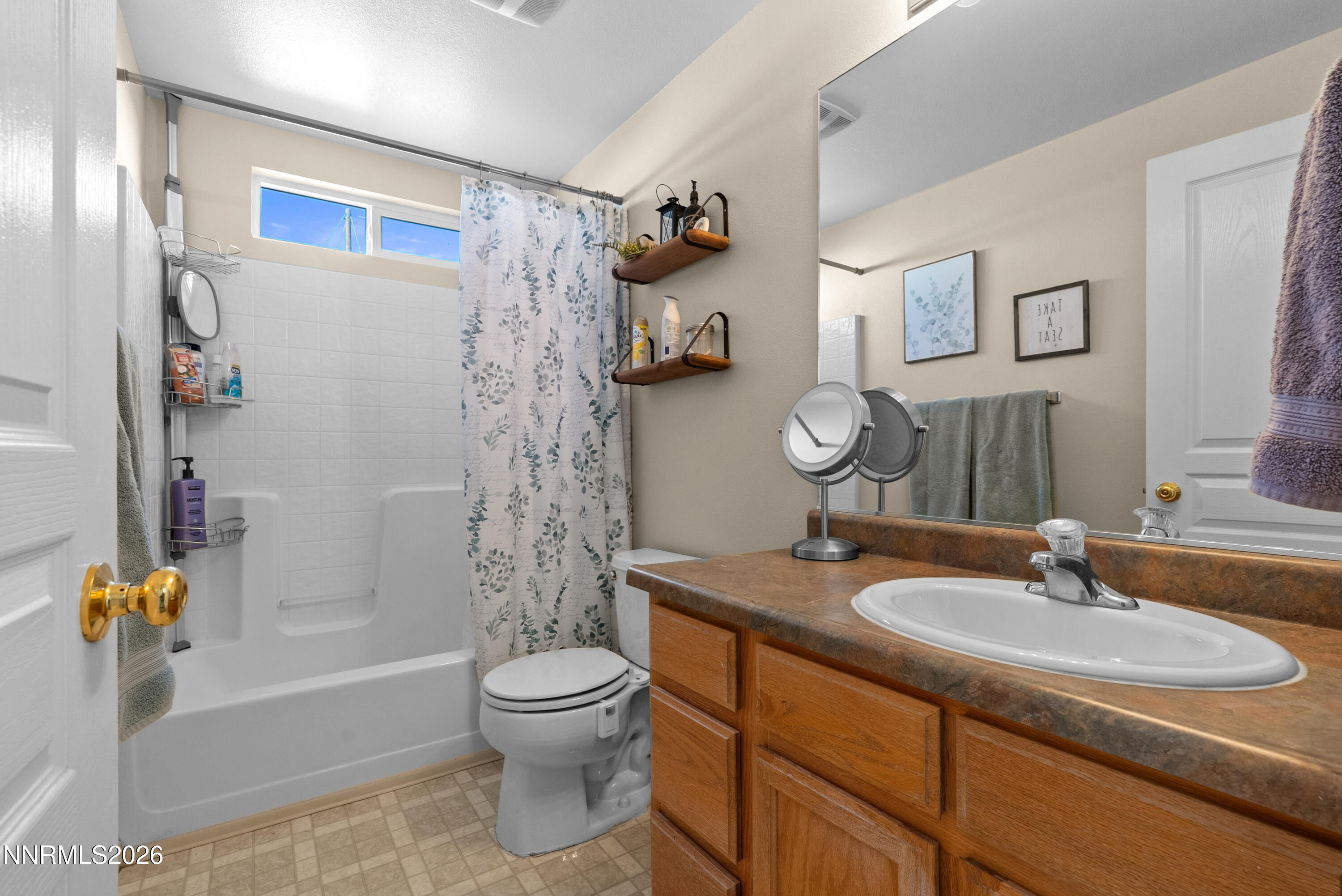 552 Spur Court Fernley, NV 89408 - Photo 34 of 46 a bathroom with a sink toilet and shower