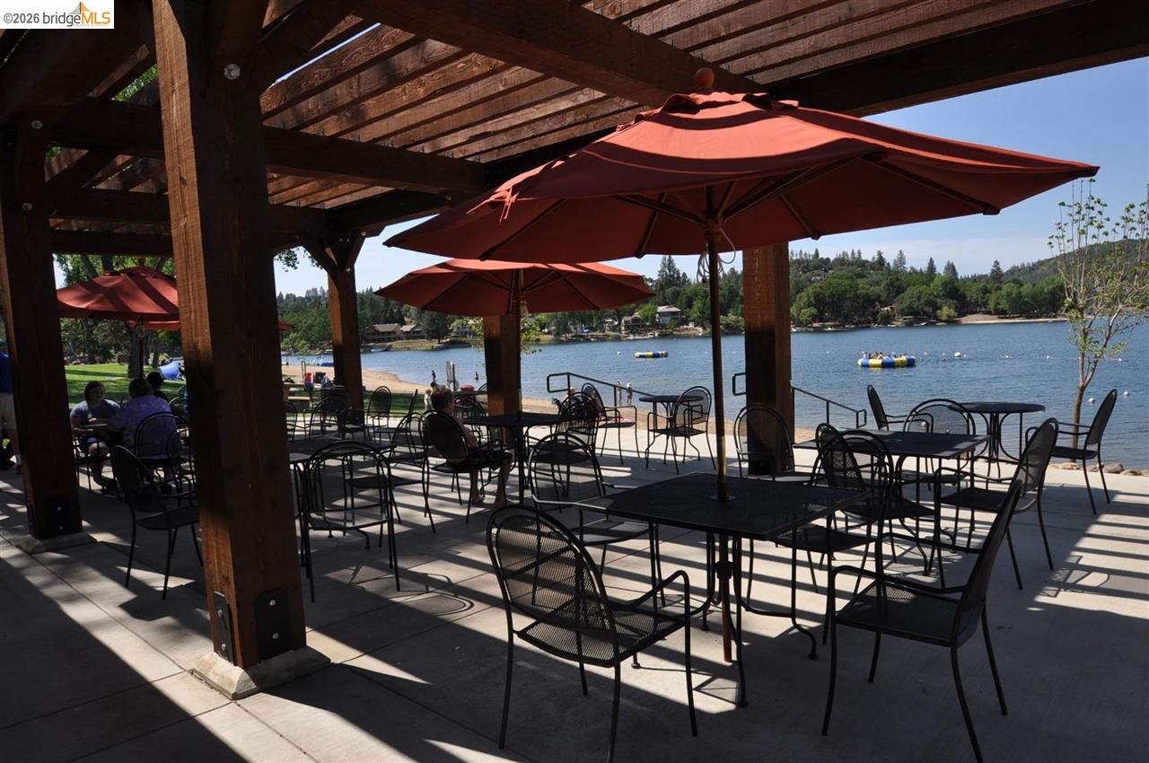 6-234 Ferretti Road Groveland, CA 95321 - Photo 16 of 36 a view of a chairs and table in the patio