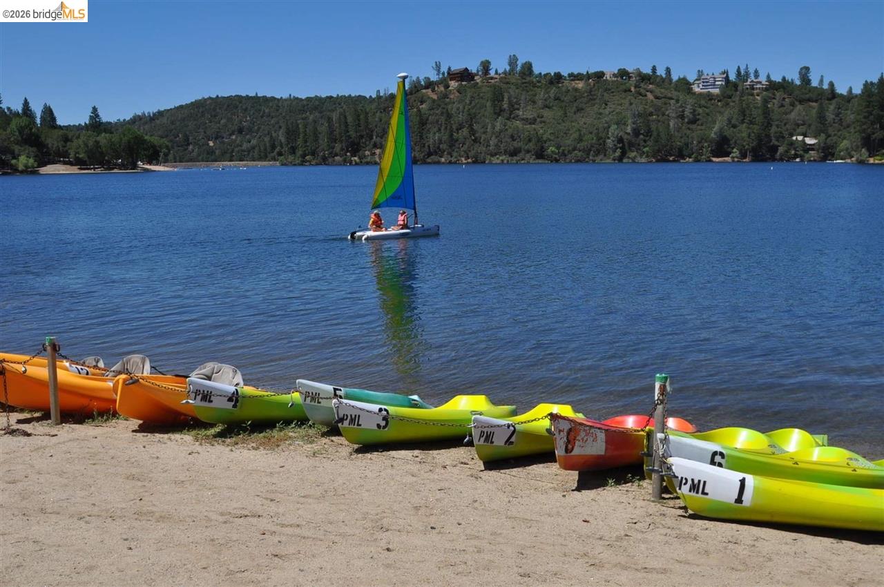 6-234 Ferretti Road Groveland, CA 95321 - Photo 23 of 36 a view of a bench with fire pit