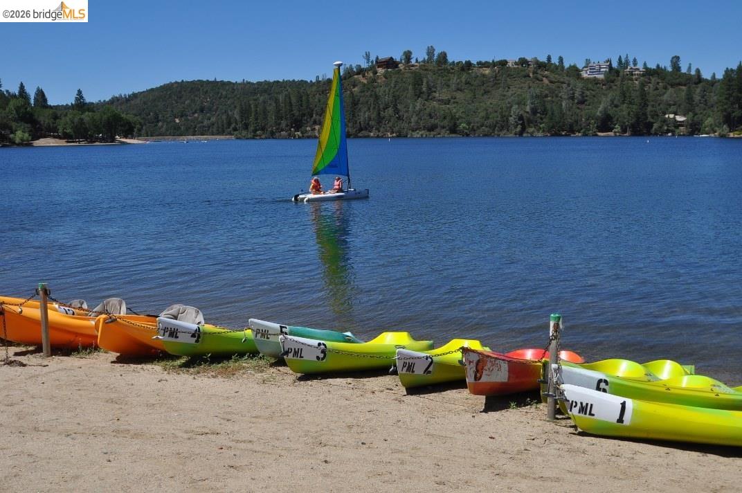 6-234 Ferretti Road Groveland, CA 95321 - Photo 31 of 36 a view of a bench with fire pit