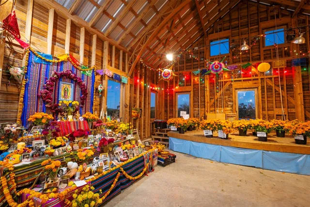 a front view of house with yard and trees in the background