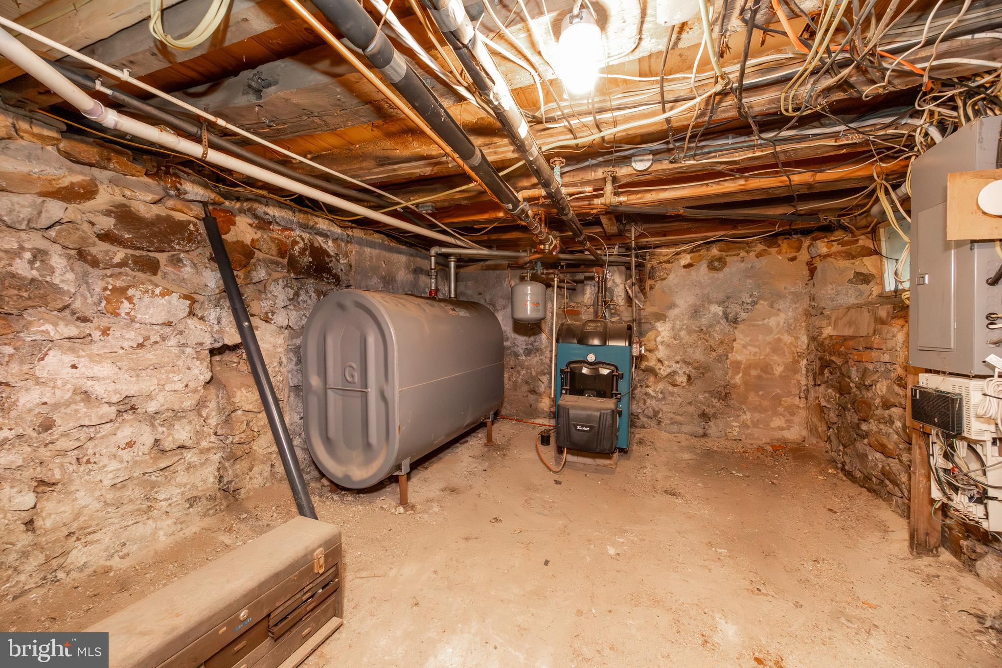 1011 State Road Lincoln University, PA 19352 - Photo 46 of 55 Basement with oil boiler