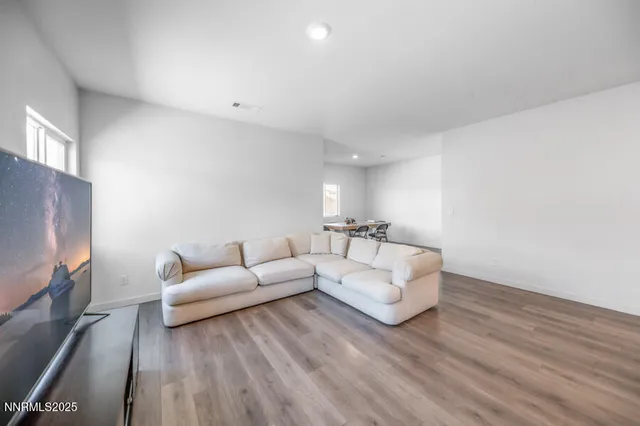 a view of a workspace with furniture