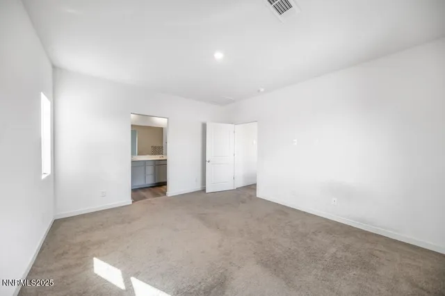 a bathroom with a double vanity sink and mirror