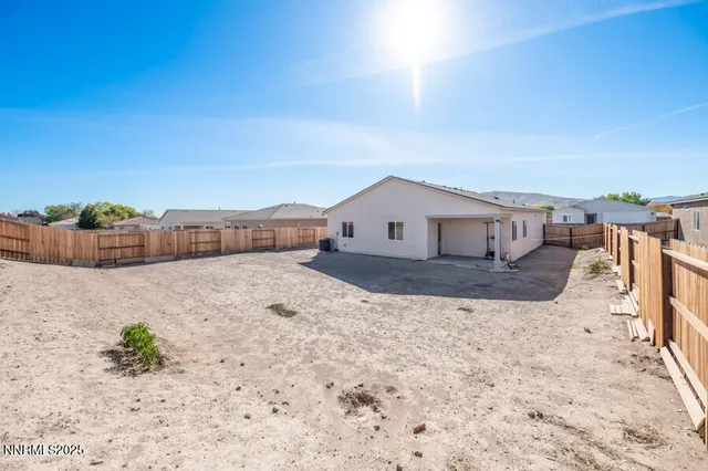 a view of an outdoor space and tennis court