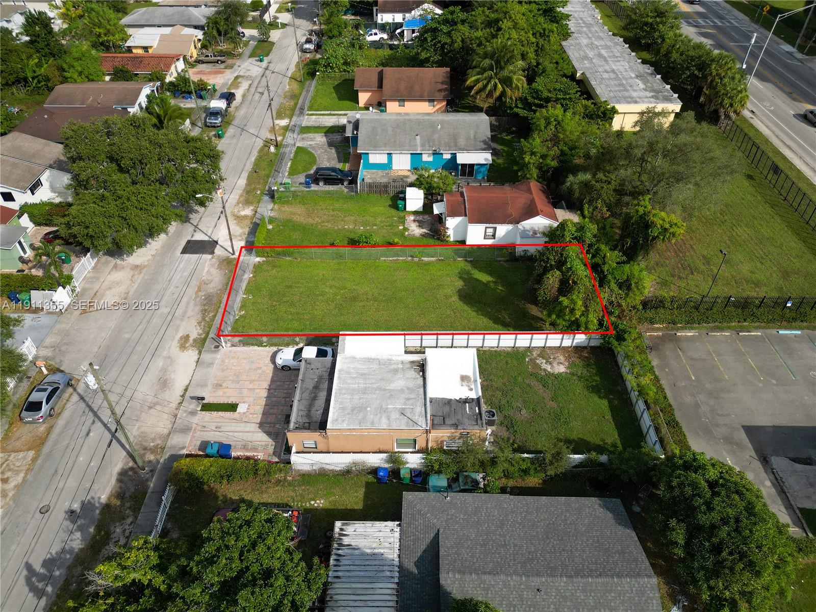 2368 Northwest 55th Street Miami, FL 33142 - Photo 11 of 14 an aerial view of multiple houses with yard