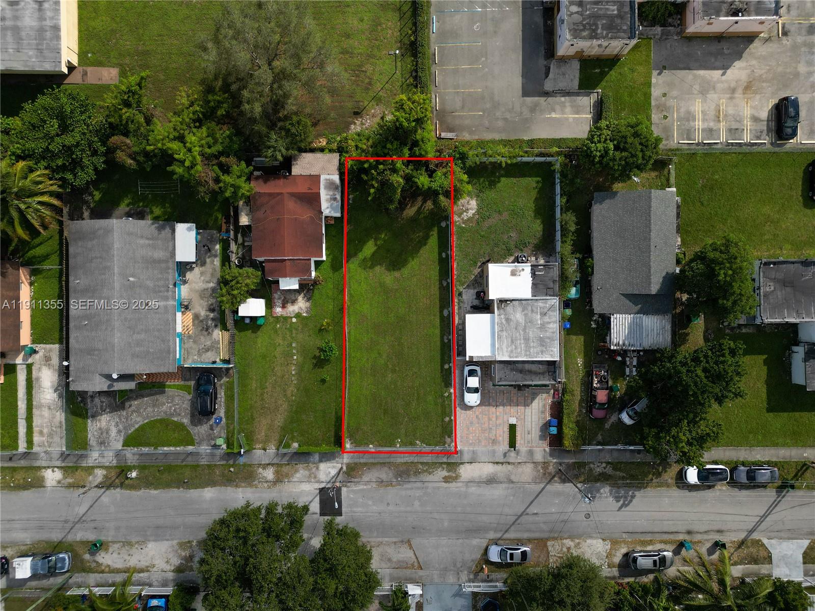 2368 Northwest 55th Street Miami, FL 33142 - Photo 2 of 14 an aerial view of multiple houses