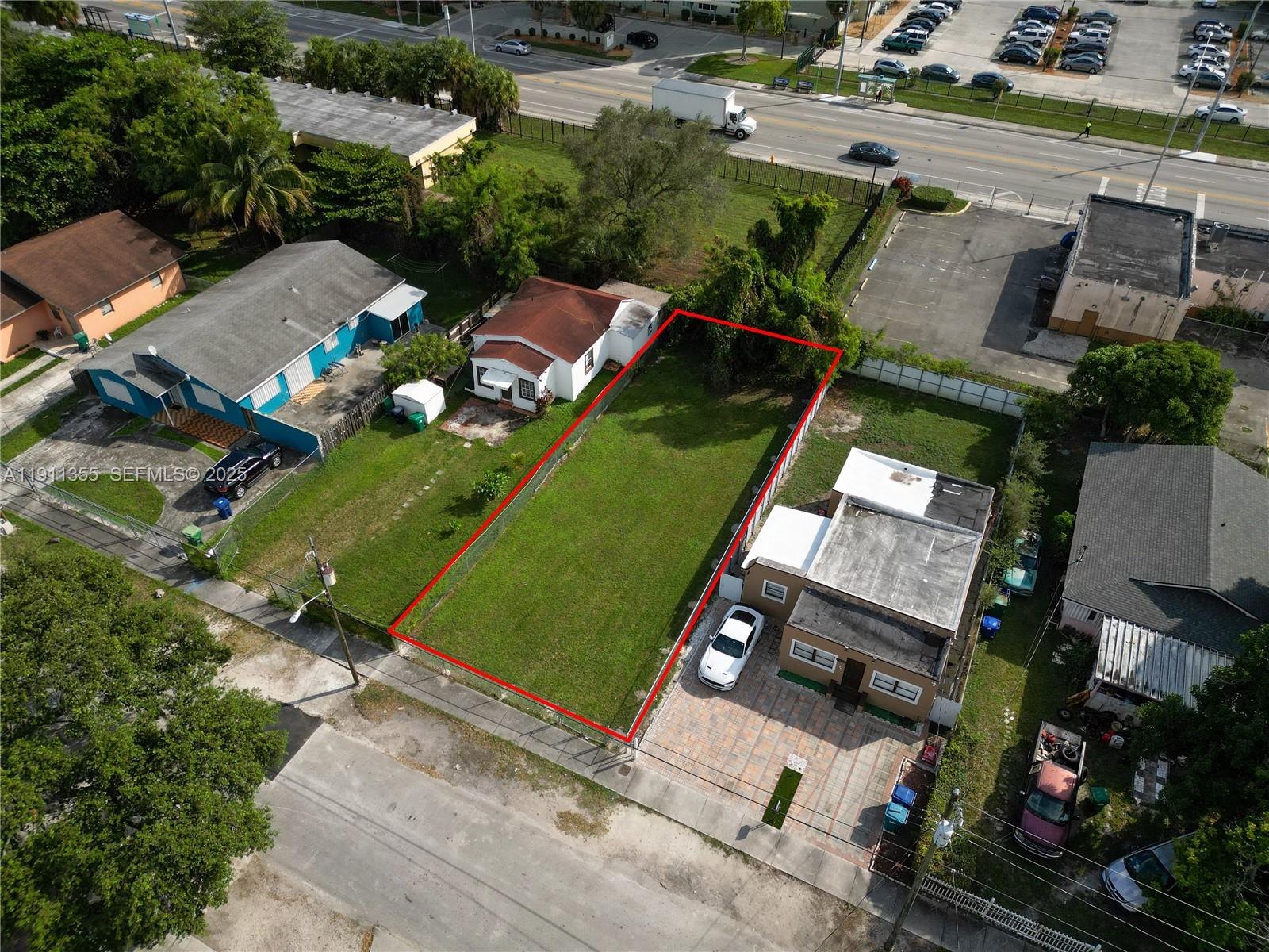2368 Northwest 55th Street Miami, FL 33142 - Photo 4 of 14 an aerial view of a house with a garden