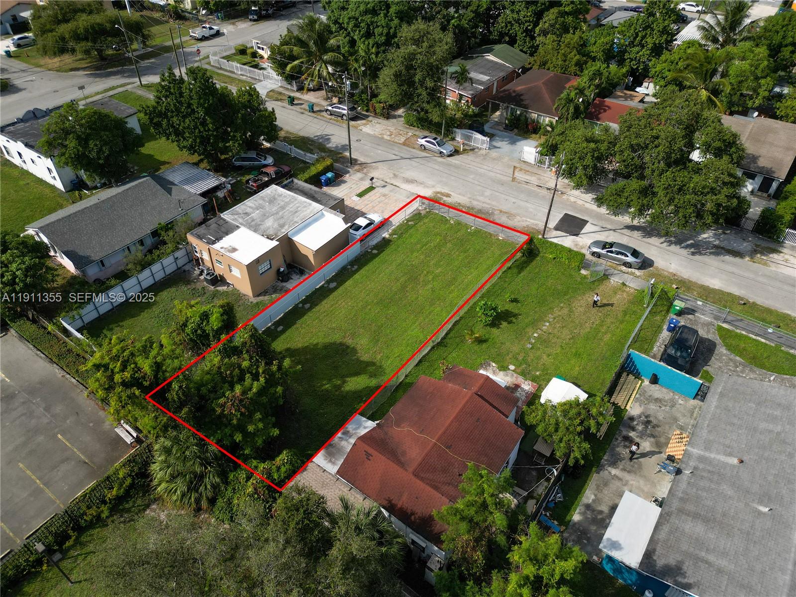 2368 Northwest 55th Street Miami, FL 33142 - Photo 7 of 14 an aerial view of a house with a garden