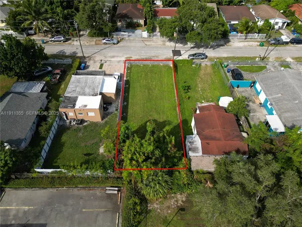 an aerial view of a house with a garden