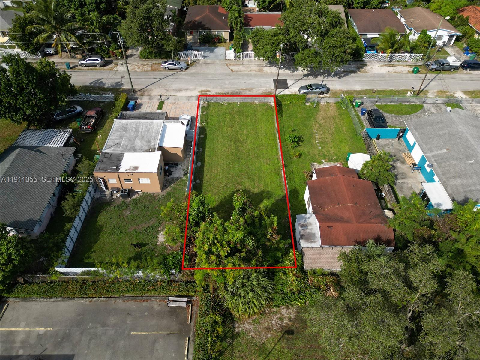 2368 Northwest 55th Street Miami, FL 33142 - Photo 8 of 14 an aerial view of a house with a garden