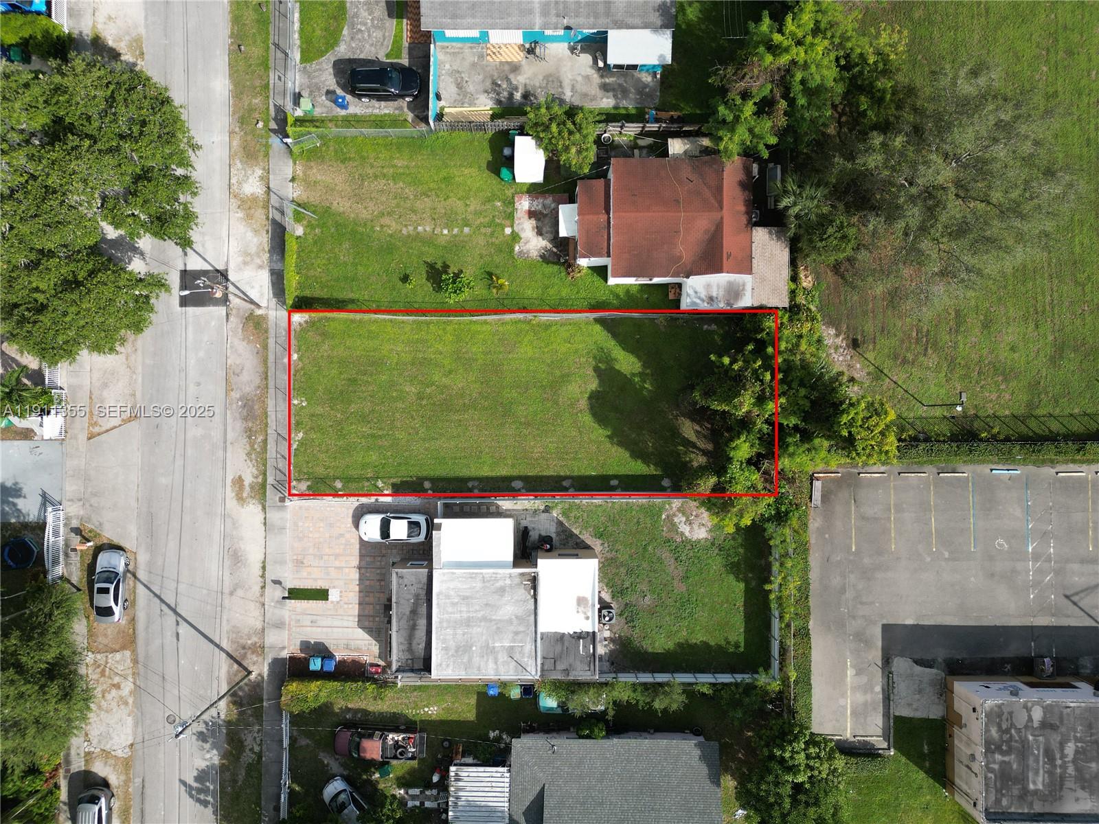 2368 Northwest 55th Street Miami, FL 33142 - Photo 10 of 14 an aerial view of a house with outdoor space pool seating area and yard