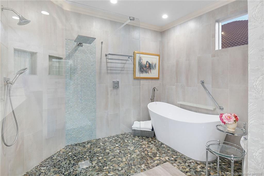2109 Southeast Talbot Place Stuart, FL 34997 - Photo 28 of 59 Free standing tub and walk-in shower in the primary bath