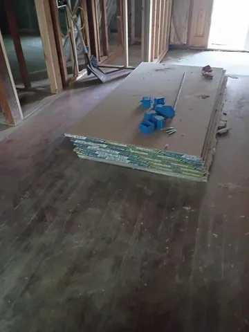 a view of a room with stainless steel appliances