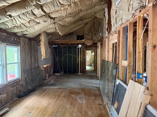 a view of hallway with windows