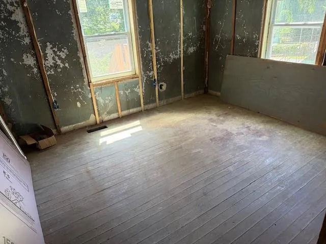 a view of outdoor space with wooden fence