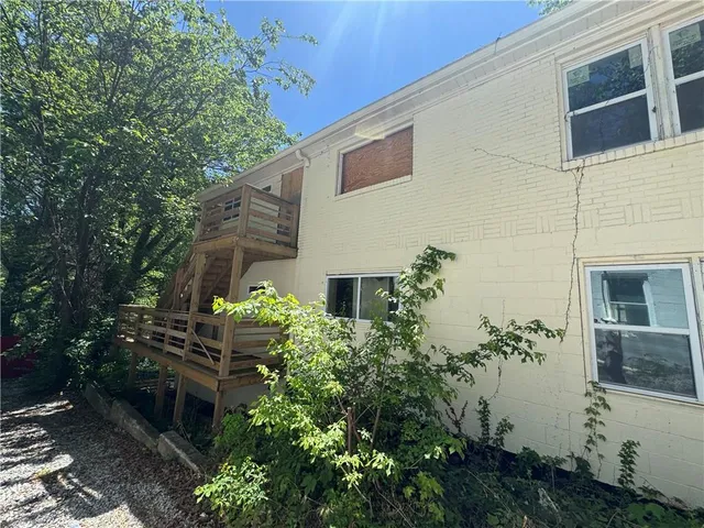 a view of a backyard with plants