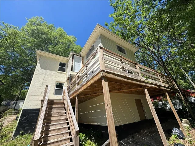 a view of a house with a large window