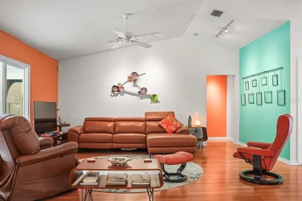 a dining room with furniture and window