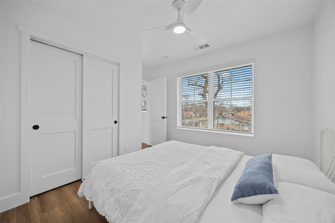 4704 Enchanted Lane, Unit B Austin, TX 78745 - Photo 17 of 23 a bedroom with a bed and a window