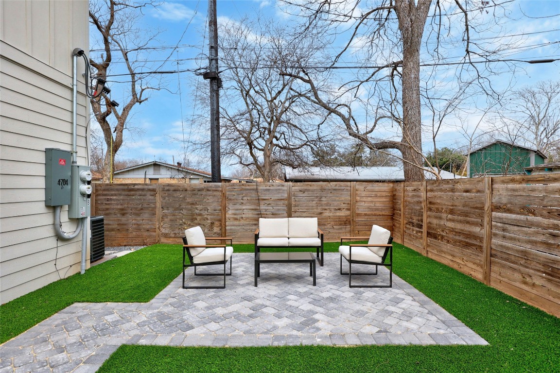 4704 Enchanted Lane, Unit B Austin, TX 78745 - Photo 20 of 23 a view of a bench in a yard