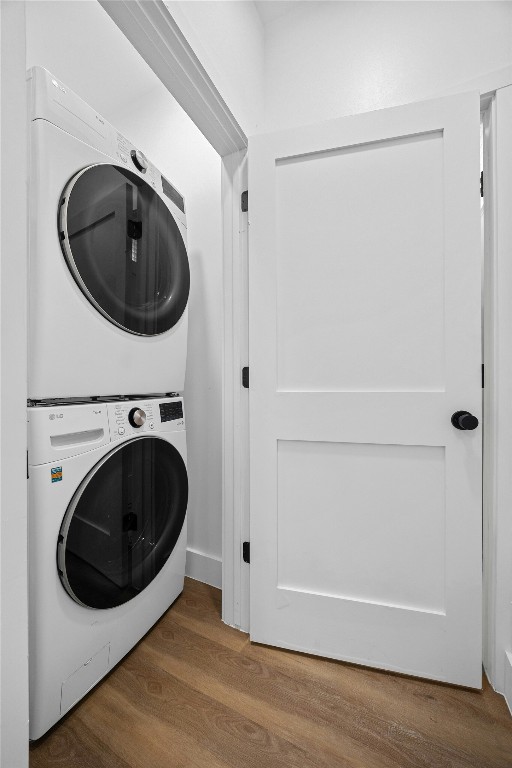 4704 Enchanted Lane, Unit B Austin, TX 78745 - Photo 10 of 23 a utility room with washing machine and a view of bedroom