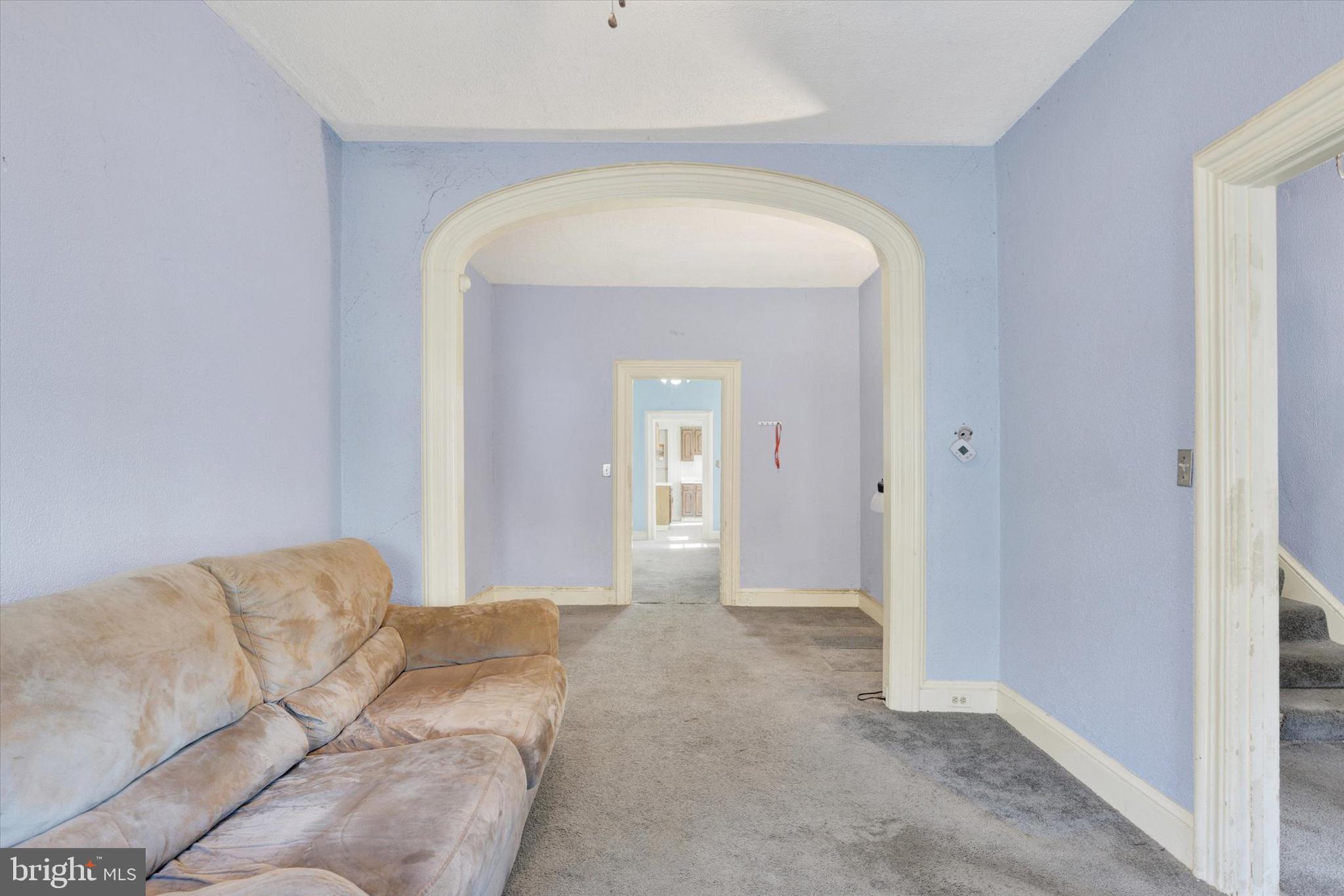 306 South 9th Street Lebanon, PA 17042 - Photo 13 of 42 a living room with a couch