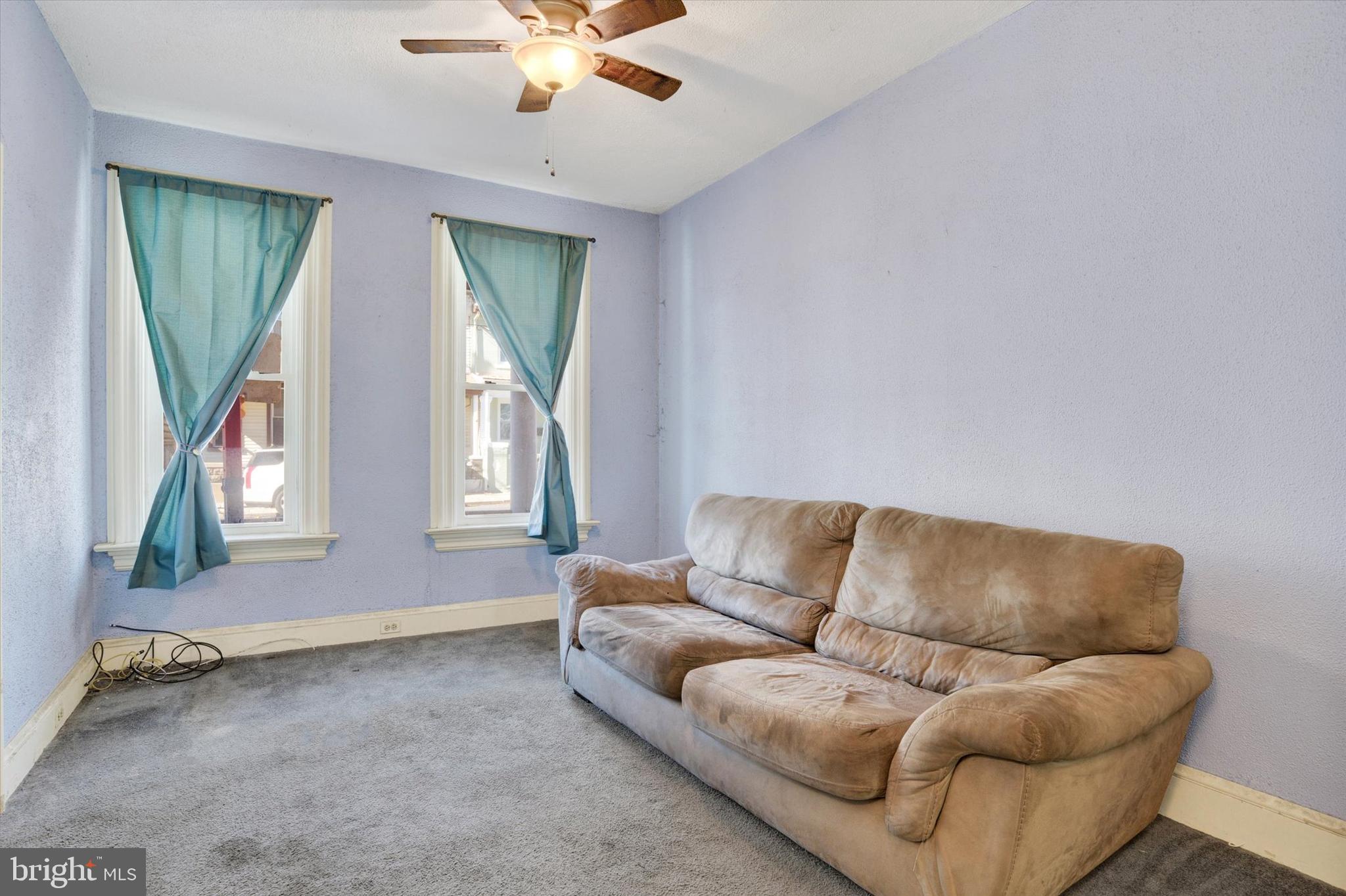 306 South 9th Street Lebanon, PA 17042 - Photo 14 of 42 a living room with furniture and a large window