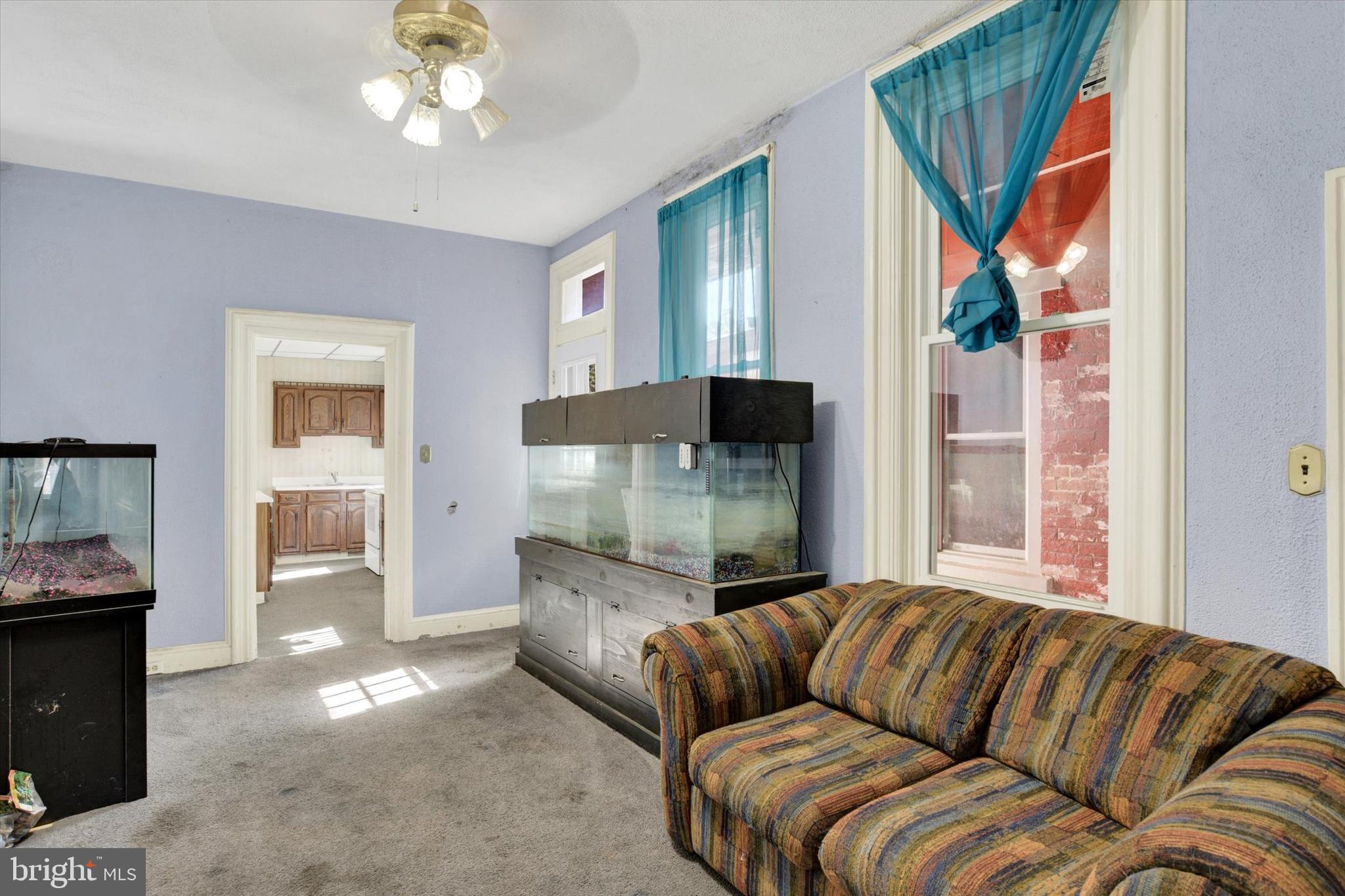 306 South 9th Street Lebanon, PA 17042 - Photo 16 of 42 a living room with furniture and a flat screen tv