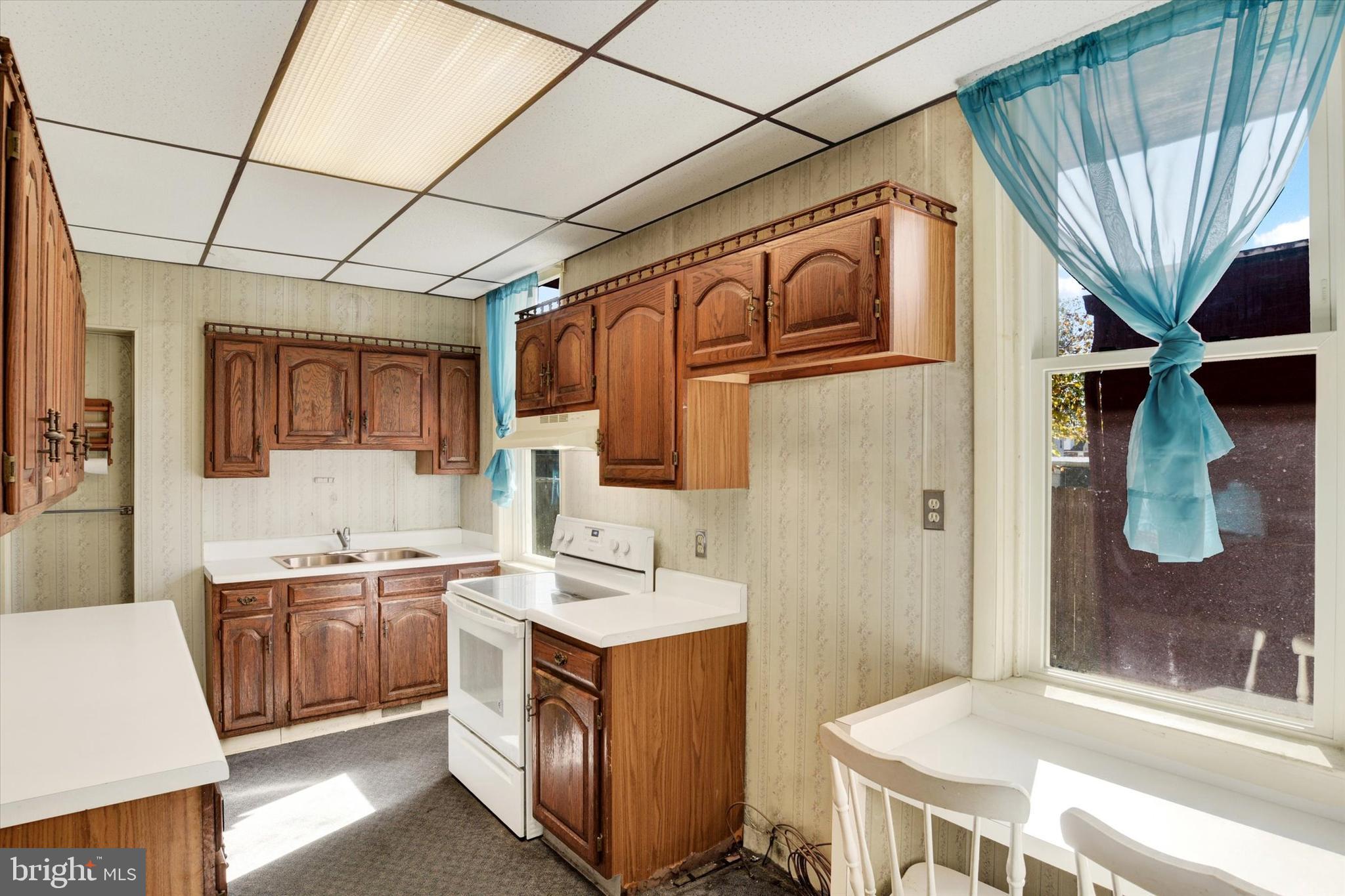 306 South 9th Street Lebanon, PA 17042 - Photo 20 of 42 a bathroom with a sink a vanity and a mirror