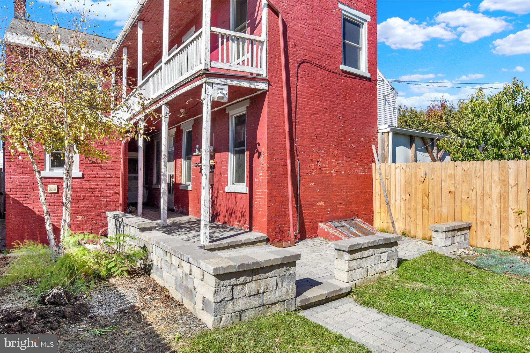306 South 9th Street Lebanon, PA 17042 - Photo 2 of 42 a front view of a house with a yard