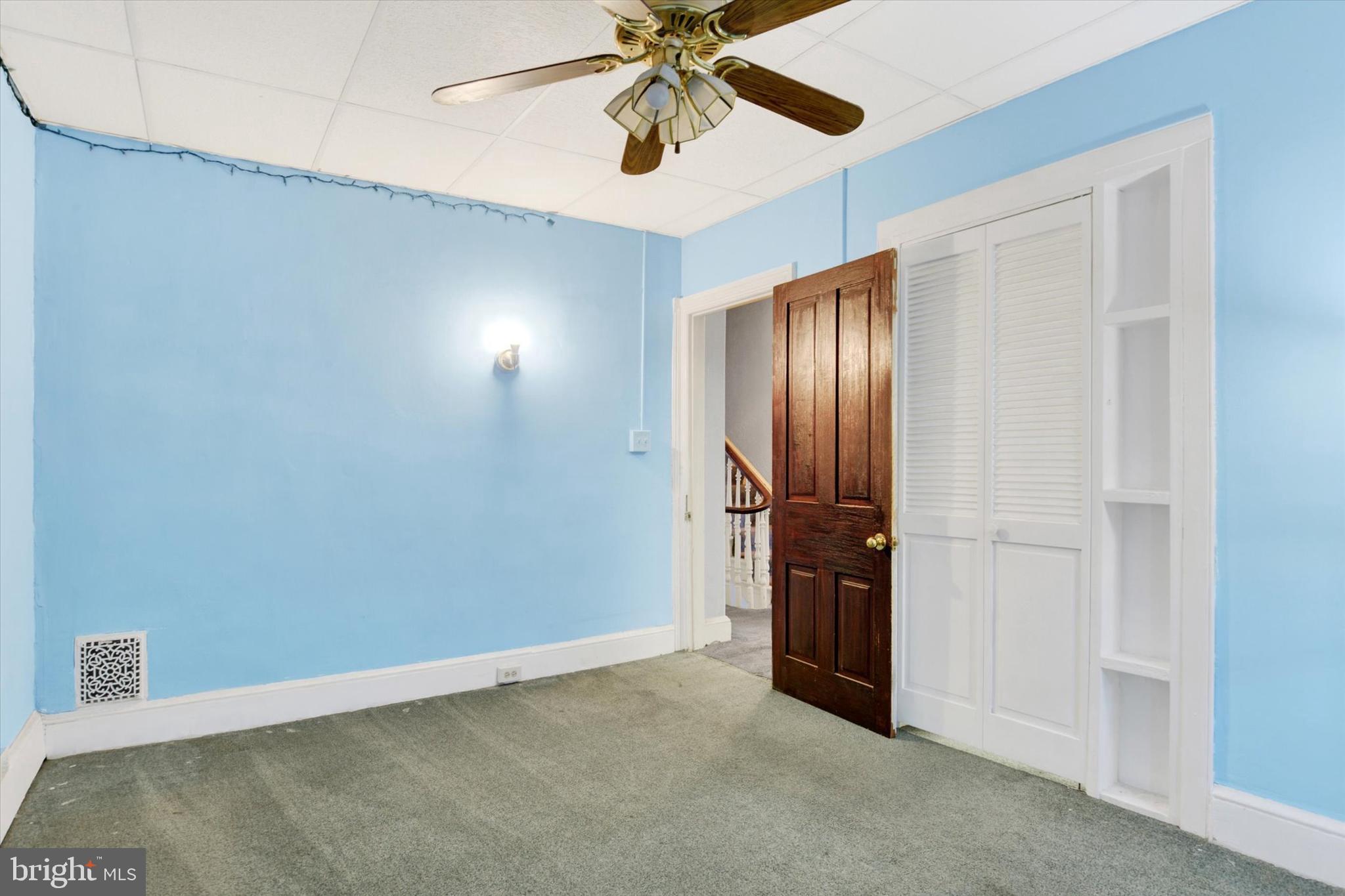 306 South 9th Street Lebanon, PA 17042 - Photo 31 of 42 a view of an empty room with closet and a ceiling fan