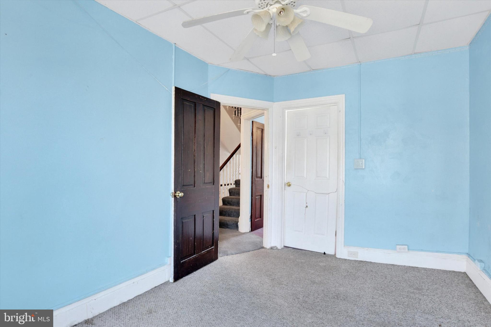 306 South 9th Street Lebanon, PA 17042 - Photo 33 of 42 an empty room with a chandelier fan and entryway