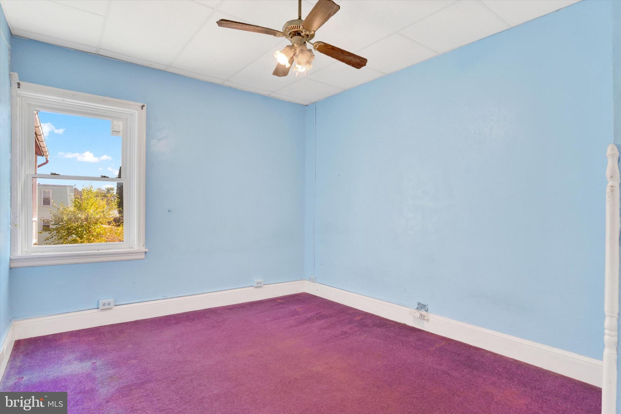306 South 9th Street Lebanon, PA 17042 - Photo 34 of 42 an empty room with windows and fan