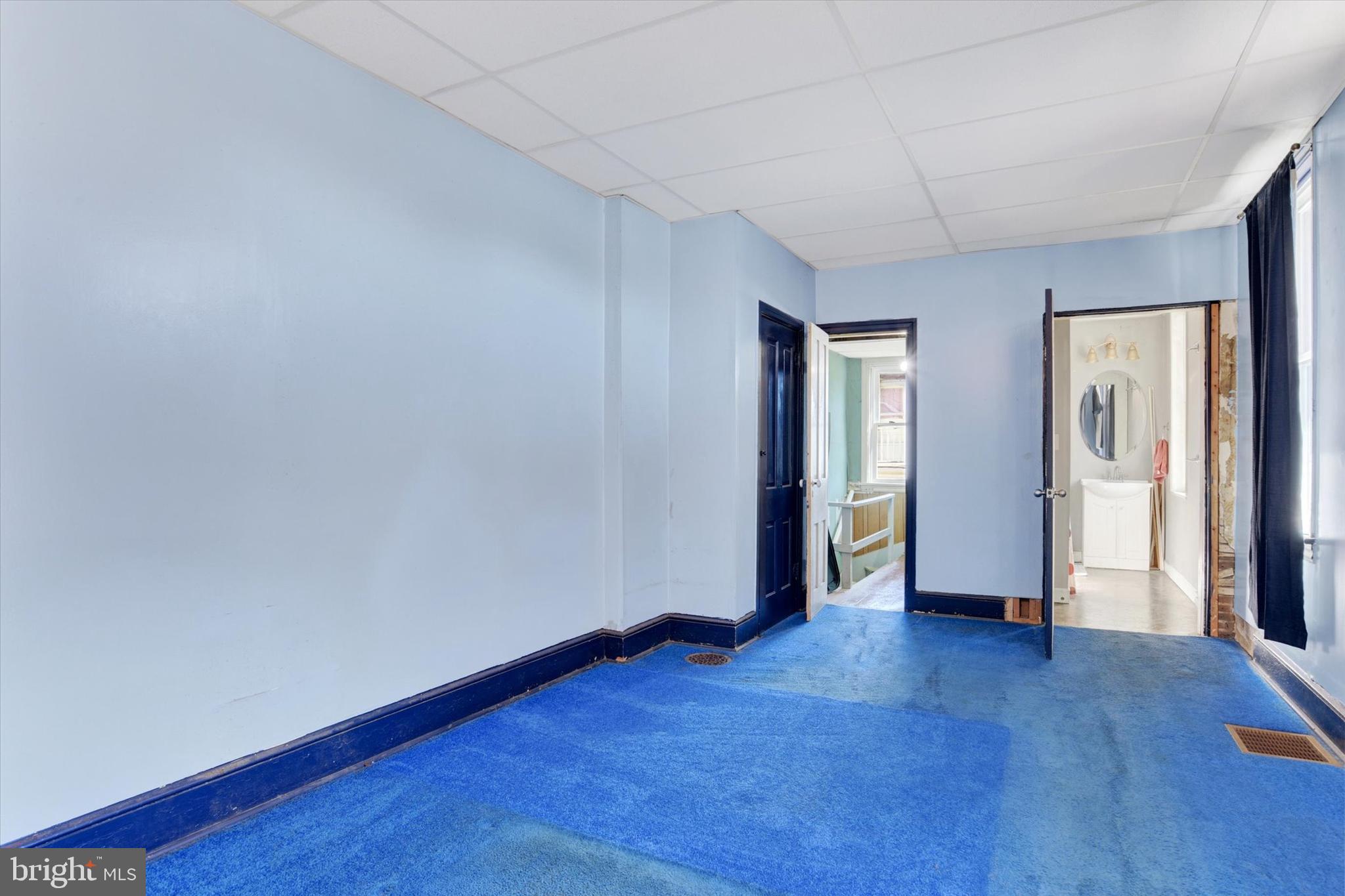 306 South 9th Street Lebanon, PA 17042 - Photo 38 of 42 an empty room with wooden floor and windows