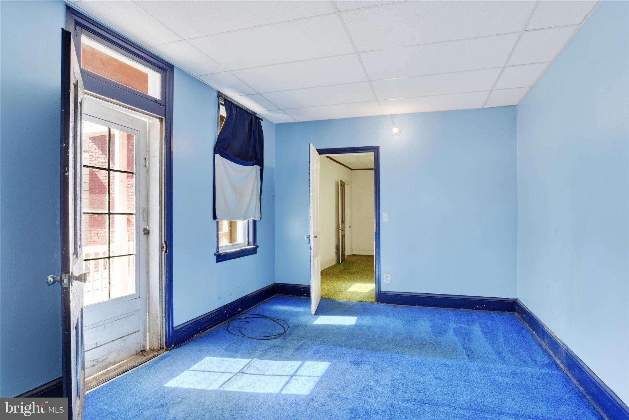 306 South 9th Street Lebanon, PA 17042 - Photo 42 of 42 an empty room with windows and cabinet