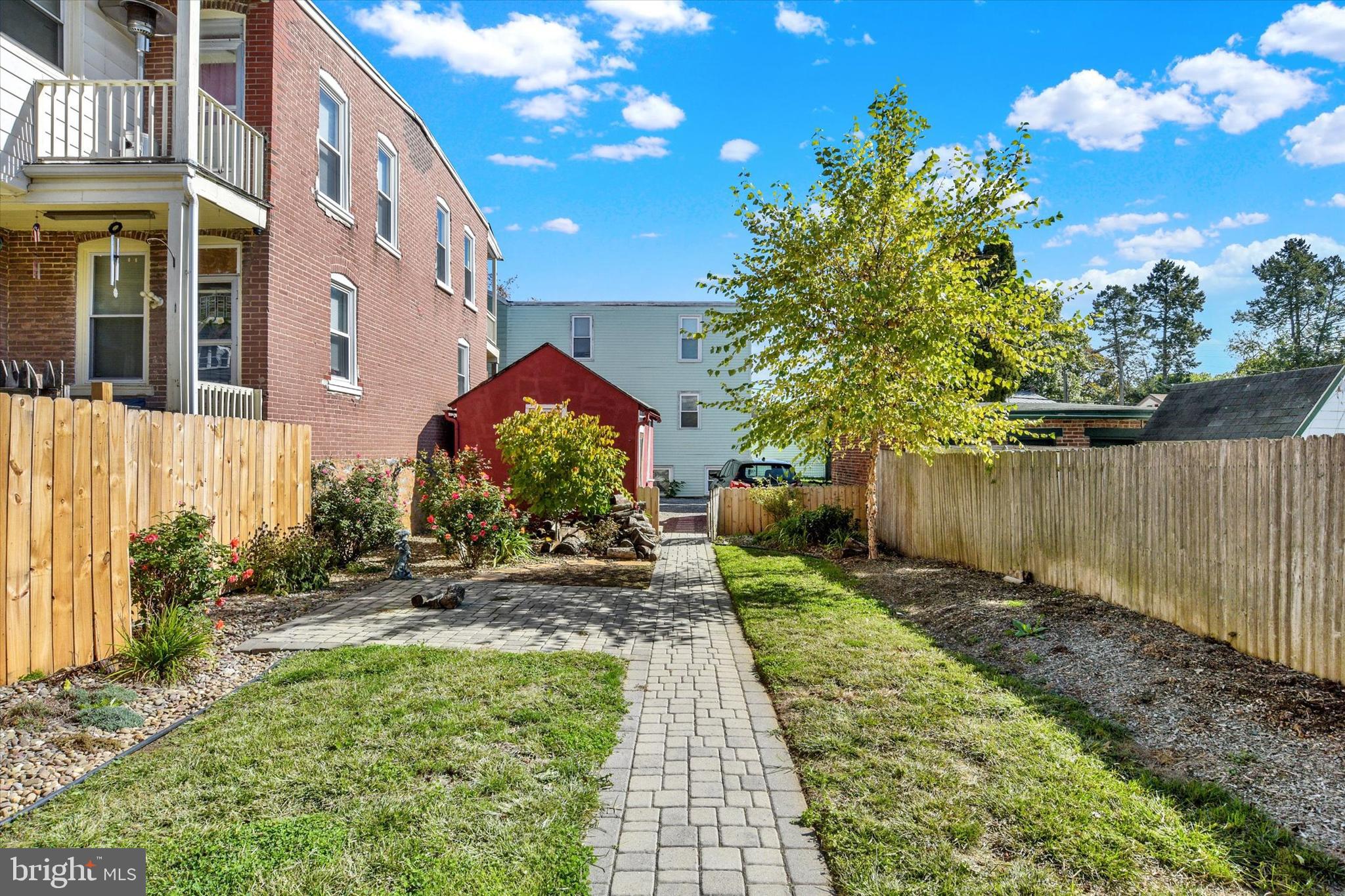 306 South 9th Street Lebanon, PA 17042 - Photo 5 of 42 a front view of a house with a yard
