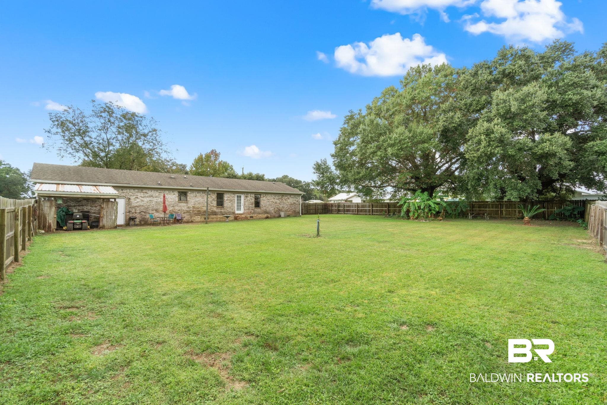 33135 Collier Road Lillian, AL 36549 - Photo 28 of 30 View of fenced backyard