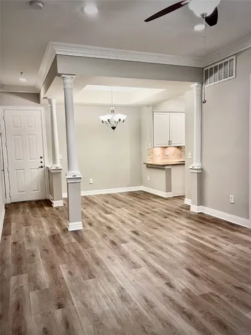 a view of a room with wooden floor and floors
