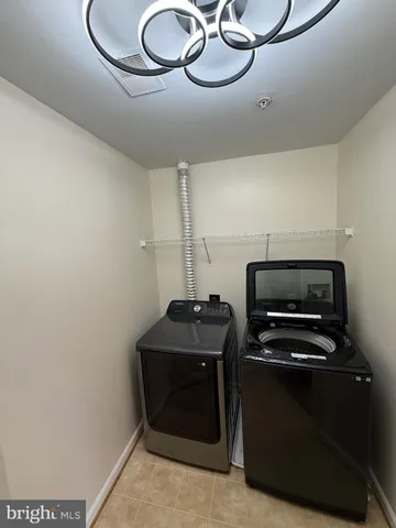 a kitchen with a stove and a microwave