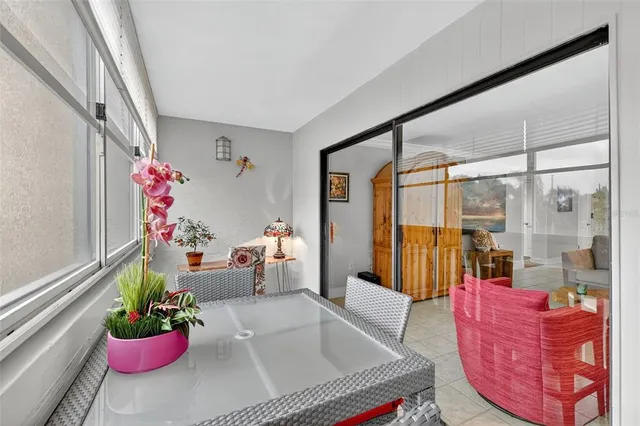 a bedroom with a large bed and a couch