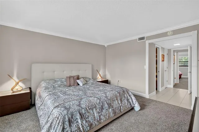 a bathroom with a shower a toilet and a sink