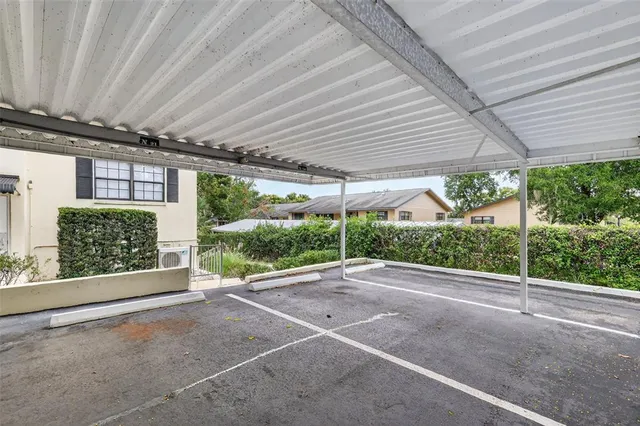 a view of a hallway with a window