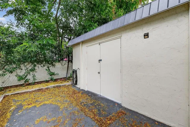 an aerial view of a house with a garden