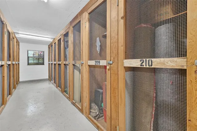 an aerial view of residential houses with outdoor space and swimming pool