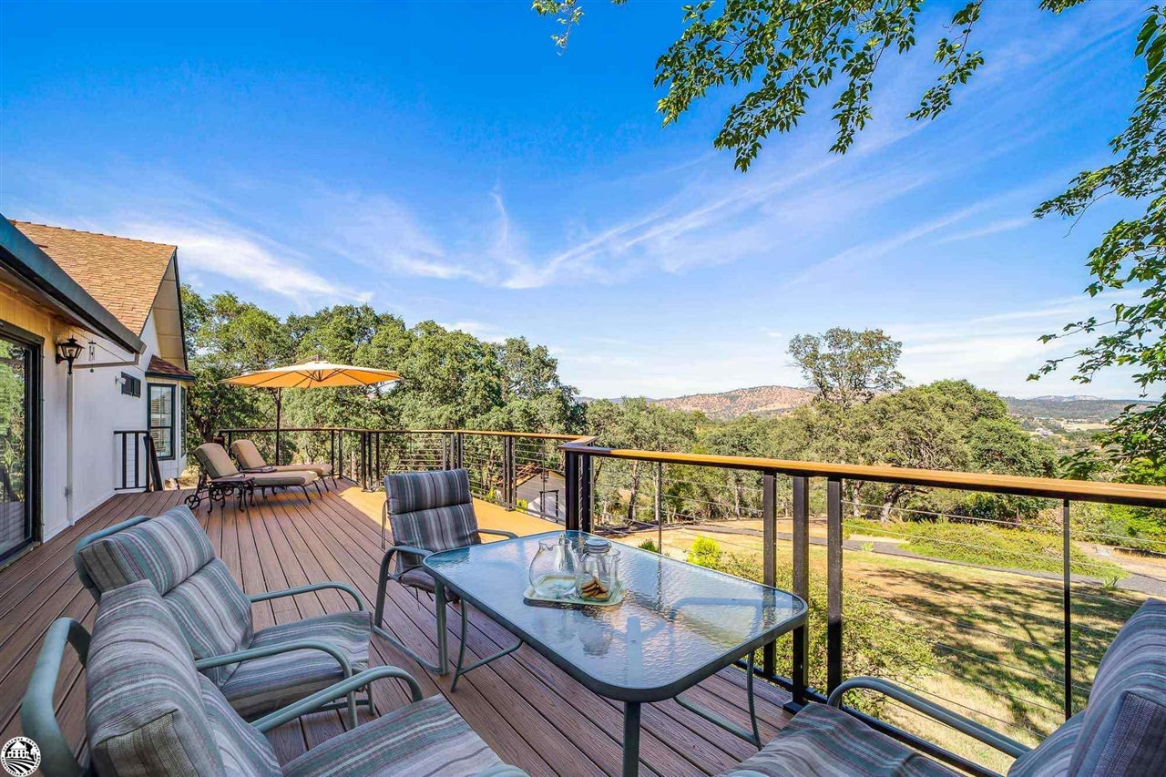 1801 Quail Hill Road Copperopolis, CA 95228 - Photo 27 of 42 a view of a balcony with lake view and mountain view